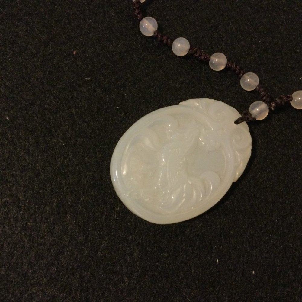 Necklace brown string with white beads and white pendant with chicken 23"-28"